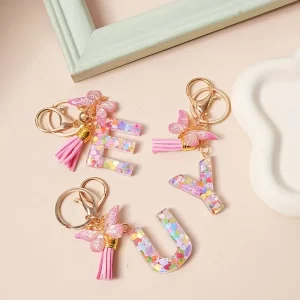 1 unique butterfly initials keychain - Durable resin, heart-shaped sequins, pink tassels, and floral pendants - Fashion bags, backpacks, and car accessories - Perfect gift for ladies on Christmas, Valentine's Day, and more, butterfly jewelry（Free Shipping）