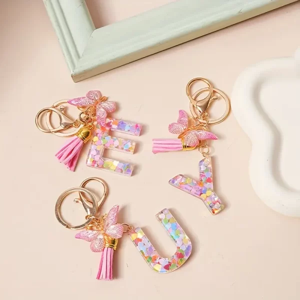 1 unique butterfly initials keychain - Durable resin, heart-shaped sequins, pink tassels, and floral pendants - Fashion bags, backpacks, and car accessories - Perfect gift for ladies on Christmas, Valentine's Day, and more, butterfly jewelry（Free Shipping）